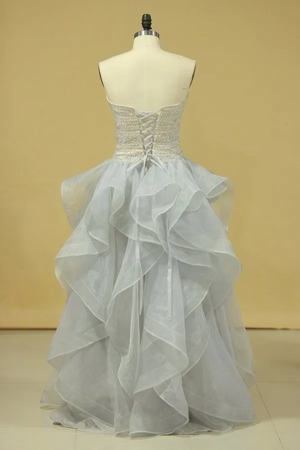 2024 Plus Size Strapless Prom Dresses Organza With Beading Floor PYEH1HGT